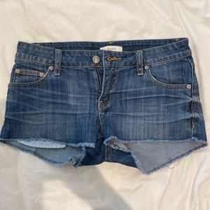 Blue Talula jean shorts from Aritzia